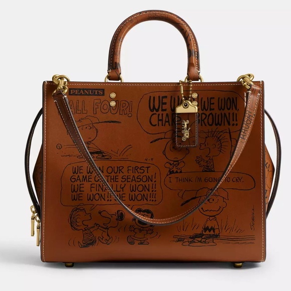 Coach Handbags - Coach X Peanuts Rogue Bag With Newspaper Print